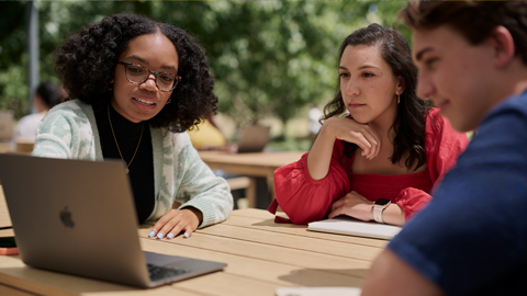 A small group of Apple interns working together at Caffè Macs.