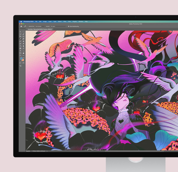 A display screen with a colorful image open in Adobe Photoshop