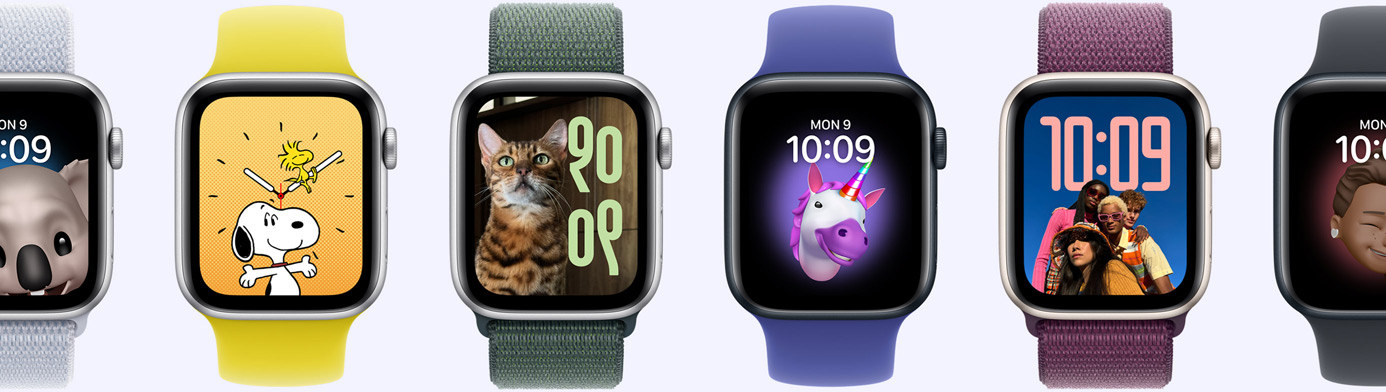 Six Apple Watch devices showing various watch face options, including Memoji, Photos, Portrait and Snoopy