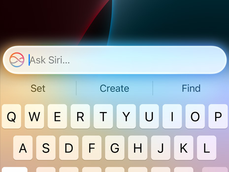 A close up of a cursor making a Siri request.