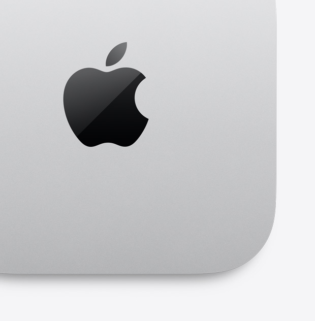 Top-down close-up view of silver Mac mini with Apple logo